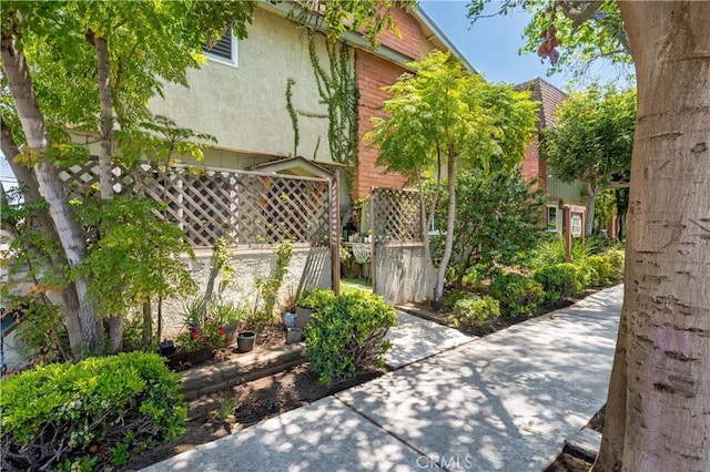 360 Obispo Ave Unit 15, Long Beach, CA 90814 - view of side of property featuring stucco siding