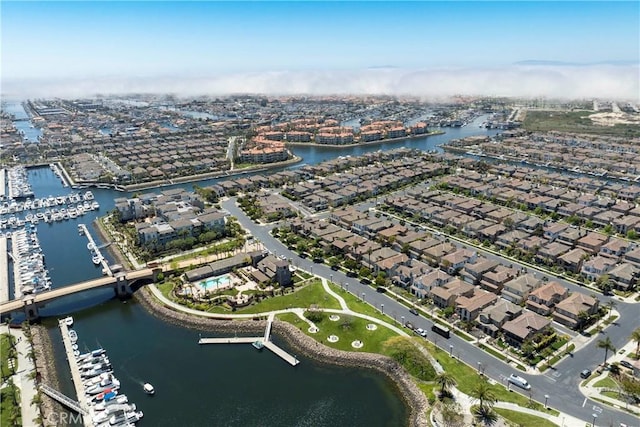 4027 W Hemlock St, Oxnard, CA 93035 - aerial view of property and surrounding area with a nearby body of water, numerous boat docks, and nearby suburban area