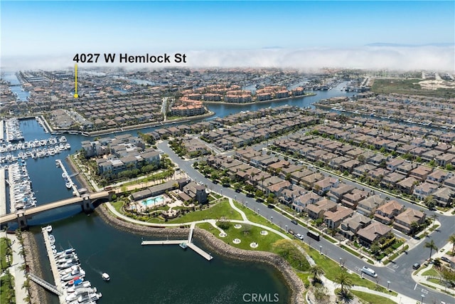 4027 W Hemlock St, Oxnard, CA 93035 - aerial overview of property's location featuring a nearby body of water, numerous boat docks, and nearby suburban area