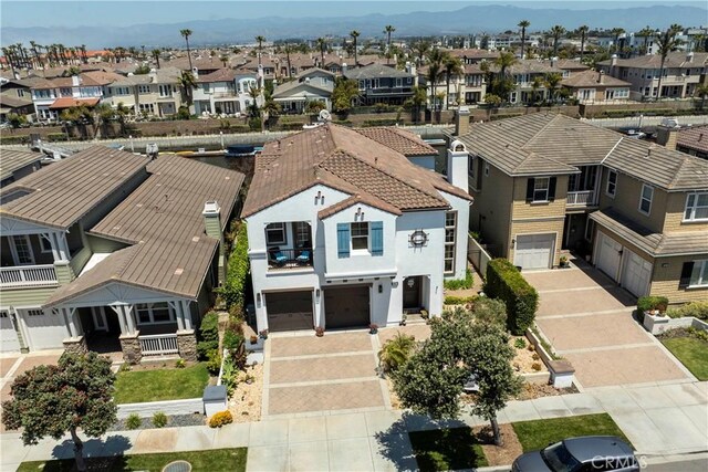 4027 W Hemlock St, Oxnard, CA 93035 - aerial perspective of suburban area featuring a mountainous background