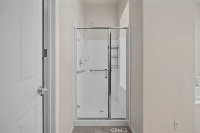 955 Union St, Cherry Valley, CA 92223 - bathroom with baseboards and a stall shower