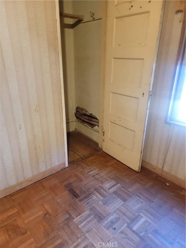 unfurnished bedroom featuring baseboards