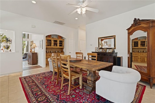 54030 Eisenhower Dr, La Quinta, CA 92253 - dining room featuring light tile patterned floors, a ceiling fan, and recessed lighting