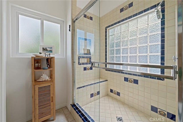 54030 Eisenhower Dr, La Quinta, CA 92253 - bathroom with a stall shower, plenty of natural light, and baseboards