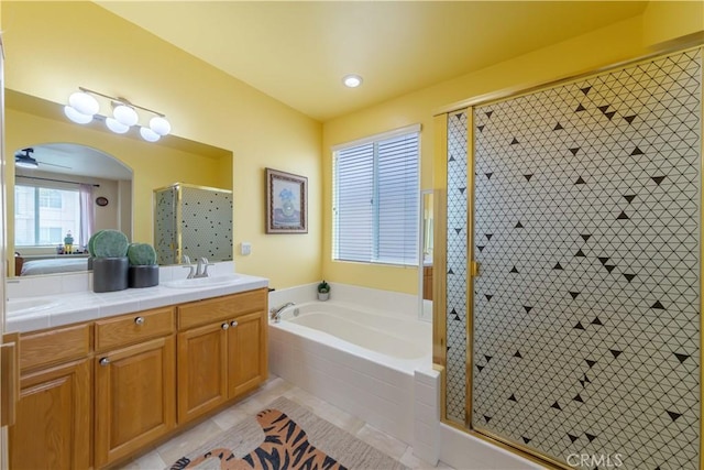 11175 Reagan St, Los Alamitos, CA 90720 - bathroom with double vanity, a garden tub, tile patterned flooring, a shower stall, and a sink