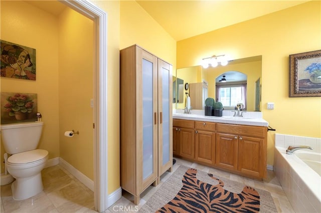 11175 Reagan St, Los Alamitos, CA 90720 - full bath featuring a sink, double vanity, toilet, tile patterned floors, and a bath
