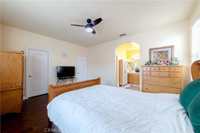 11175 Reagan St, Los Alamitos, CA 90720 - bedroom with ceiling fan, ensuite bath, arched walkways, wood finished floors, and visible vents