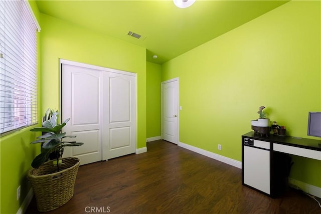 11175 Reagan St, Los Alamitos, CA 90720 - interior space featuring baseboards, dark wood-style floors, and visible vents