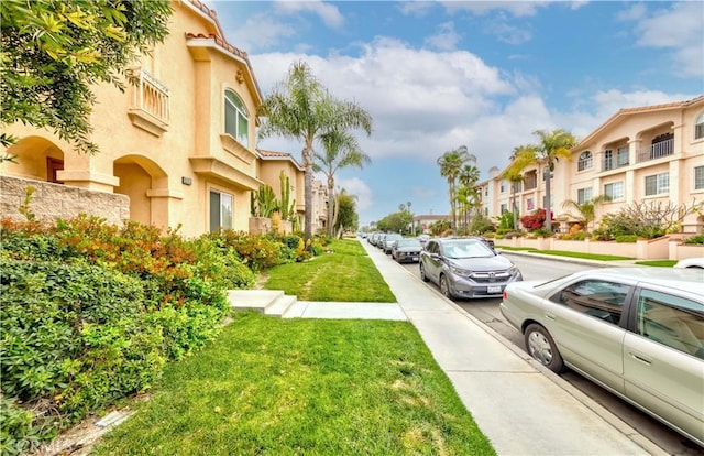 11175 Reagan St, Los Alamitos, CA 90720 - view of road with sidewalks and a residential view