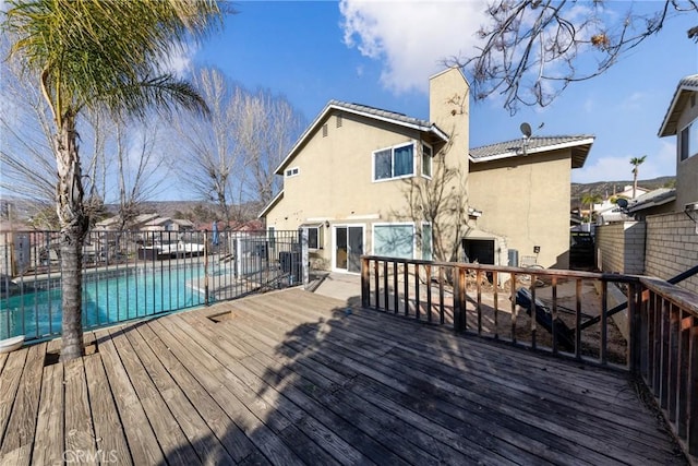 11874 Cornell Ln, Yucaipa, CA 92399 - wooden deck with a fenced in pool and fence