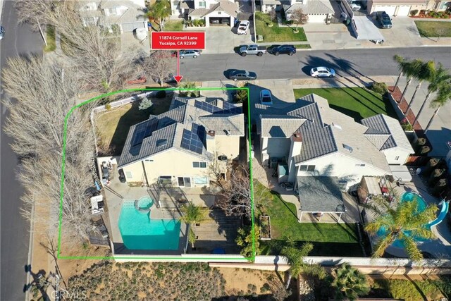 11874 Cornell Ln, Yucaipa, CA 92399 - aerial view of residential area with property boundaries highlighted and a pool area