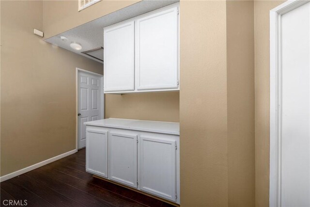 11874 Cornell Ln, Yucaipa, CA 92399 - bar featuring dark wood-style flooring and baseboards