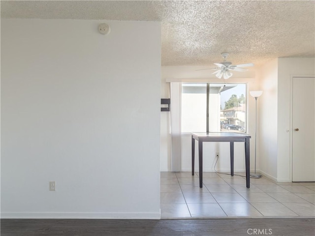 3501 20th St, Highland, CA 92346 - unfurnished room featuring a ceiling fan, baseboards, a textured ceiling, and wood finished floors