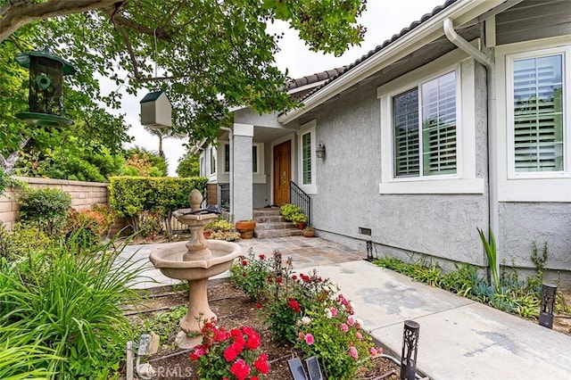 exterior space with a patio and fence