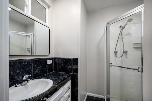 bathroom featuring vanity and a shower stall