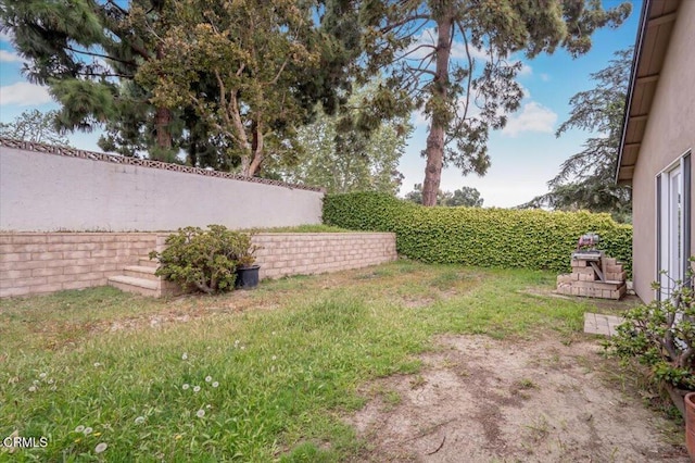 view of yard with fence