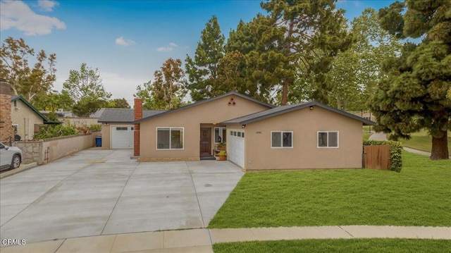 single story home with concrete driveway, stucco siding, a front lawn, and a garage