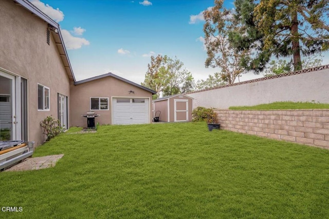 view of yard with an outdoor structure and a shed