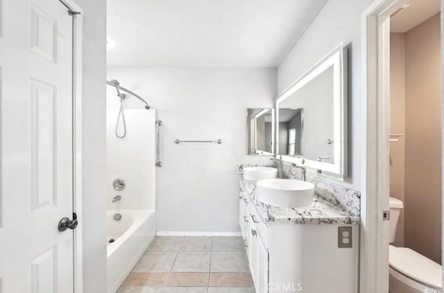25624 Driftview Cir, Menifee, CA 92584 - full bath featuring toilet, double vanity, tile patterned floors, baseboards, and washtub / shower combination