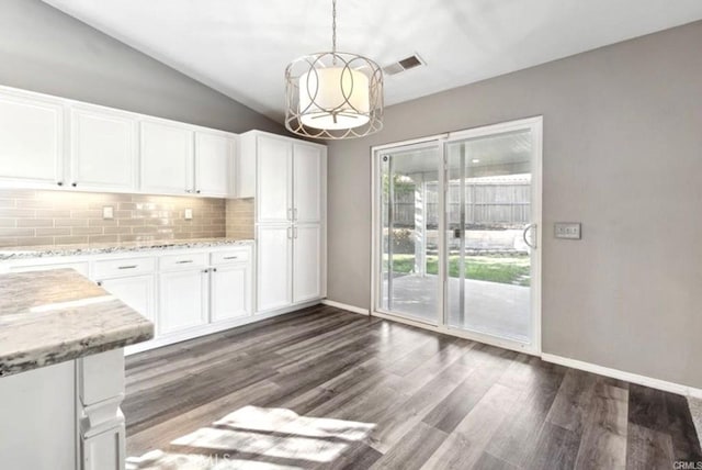 25624 Driftview Cir, Menifee, CA 92584 - kitchen featuring backsplash, baseboards, white cabinets, dark wood-style flooring, and light stone countertops
