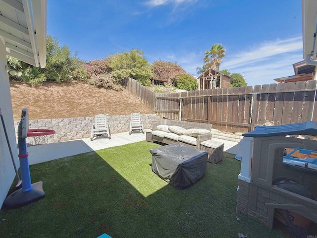 view of yard featuring a patio, fence, and an outdoor living space