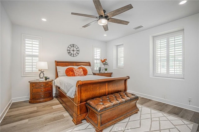 12931 Lotus St, Garden Grove, CA 92840 - bedroom featuring multiple windows, visible vents, light wood-style flooring, and recessed lighting