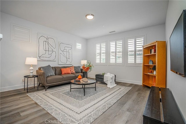 12931 Lotus St, Garden Grove, CA 92840 - living room featuring wood finished floors and baseboards