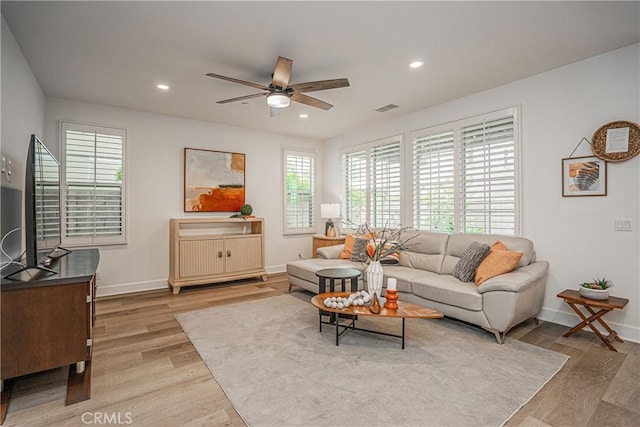 12931 Lotus St, Garden Grove, CA 92840 - living area featuring light wood-style flooring, visible vents, baseboards, ceiling fan, and recessed lighting