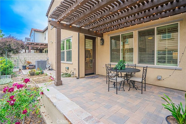 12931 Lotus St, Garden Grove, CA 92840 - view of patio / terrace with cooling unit, outdoor dining area, a pergola, and fence