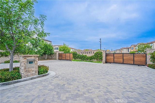12931 Lotus St, Garden Grove, CA 92840 - view of gate with fence and a residential view