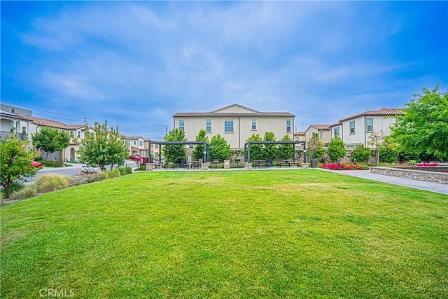12931 Lotus St, Garden Grove, CA 92840 - view of front of property featuring a front yard, a pergola, and a residential view