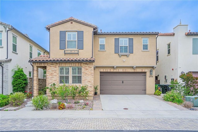 12931 Lotus St, Garden Grove, CA 92840 - view of front of property featuring stucco siding, concrete driveway, a garage, and a tiled roof
