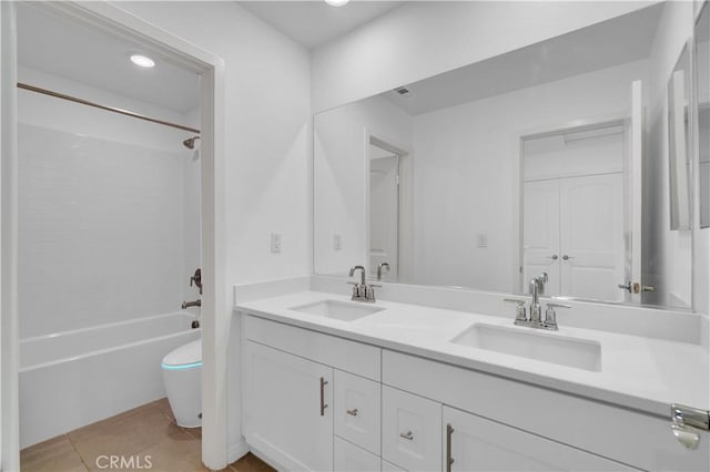 14667 Gulfstream Ln, Moreno Valley, CA 92553 - bathroom featuring tile patterned floors, double vanity, washtub / shower combination, and a sink