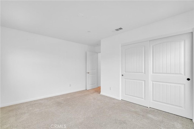 14667 Gulfstream Ln, Moreno Valley, CA 92553 - unfurnished bedroom featuring carpet floors, baseboards, visible vents, and a closet