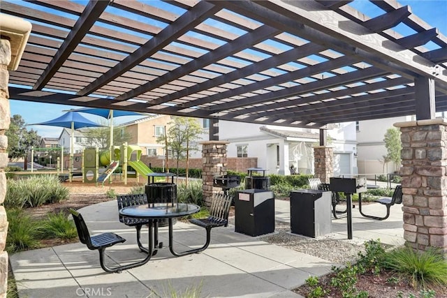 14667 Gulfstream Ln, Moreno Valley, CA 92553 - view of patio with a pergola and playground community