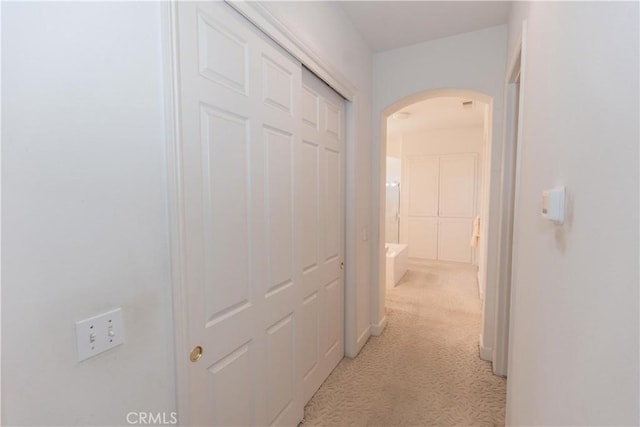 1490 N Dewitt Ave, Clovis, CA 93619 - hallway with arched walkways and light colored carpet