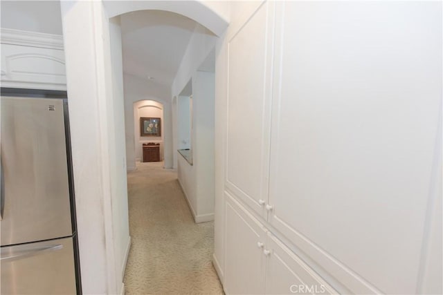 1490 N Dewitt Ave, Clovis, CA 93619 - corridor featuring light carpet, arched walkways, and baseboards