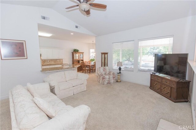1490 N Dewitt Ave, Clovis, CA 93619 - living area featuring baseboards, ceiling fan, visible vents, and light colored carpet