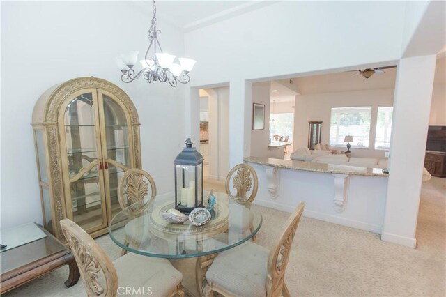 1490 N Dewitt Ave, Clovis, CA 93619 - dining space with an inviting chandelier and carpet
