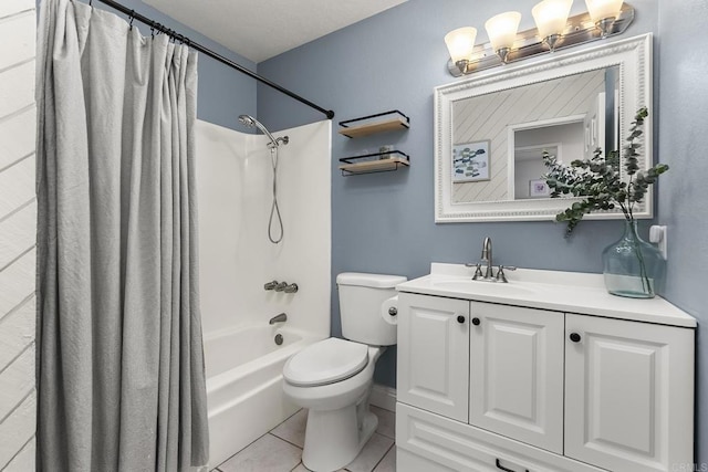 full bath featuring vanity, toilet, tile patterned flooring, and shower / bath combo