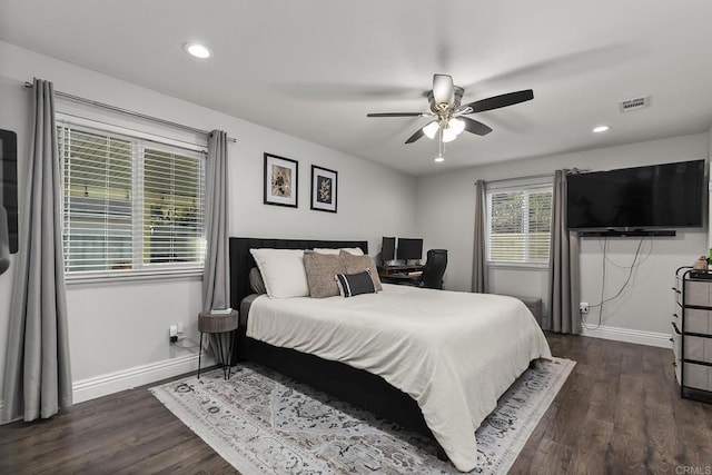 bedroom featuring baseboards, recessed lighting, dark wood finished floors, and visible vents