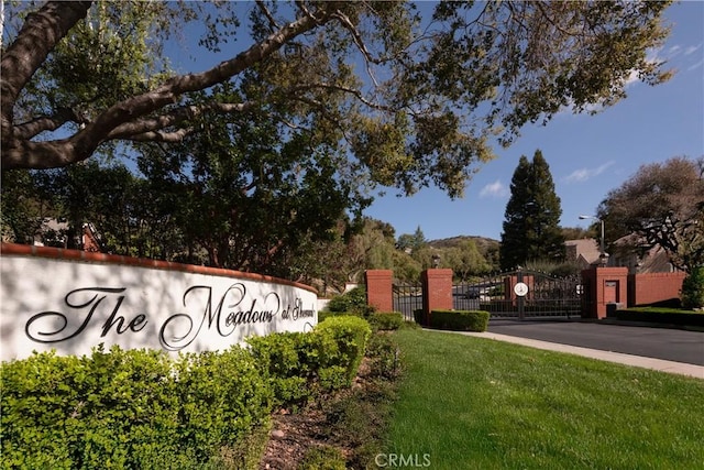 184 Halsbury Ct, Lake Sherwood, CA 91361 - community / neighborhood sign with a gate, fence, and a lawn