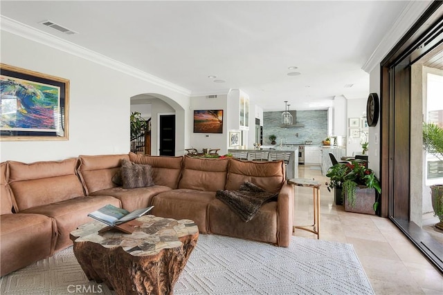 184 Halsbury Ct, Lake Sherwood, CA 91361 - living room featuring crown molding, light tile patterned floors, visible vents, and arched walkways