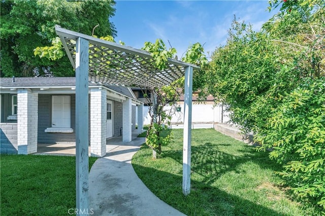 10541 Cliota St, Whittier, CA 90601 - view of yard featuring a pergola