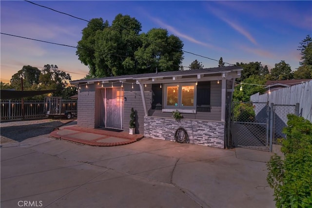 10541 Cliota St, Whittier, CA 90601 - view of front of property with a patio and brick siding