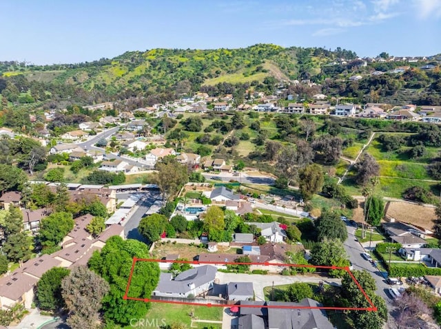 10541 Cliota St, Whittier, CA 90601 - aerial perspective of suburban area featuring property parcel outlined