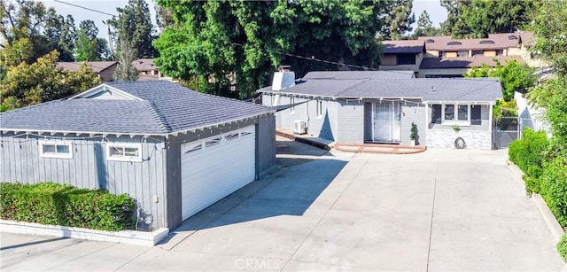 10541 Cliota St, Whittier, CA 90601 - ranch-style house featuring a chimney, board and batten siding, and roof with shingles