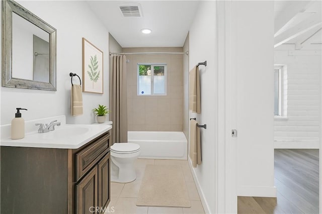 10541 Cliota St, Whittier, CA 90601 - full bath with vanity, shower / tub combo with curtain, and wood finished floors