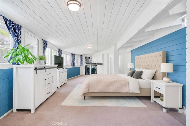 10541 Cliota St, Whittier, CA 90601 - bedroom with washing machine and dryer, light colored carpet, and wood ceiling