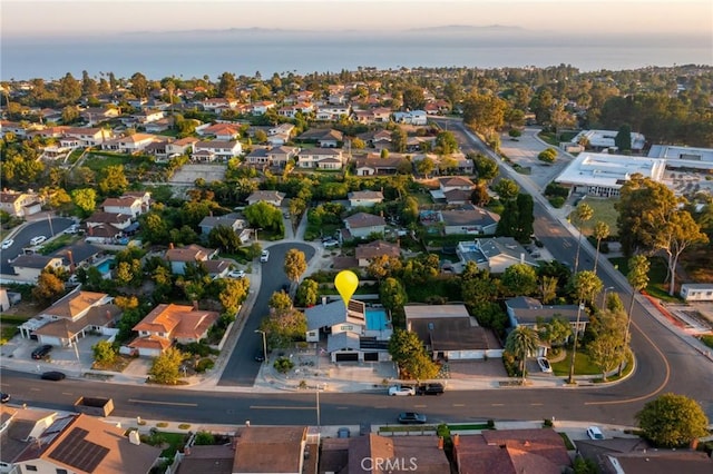 aerial view at dusk with a residential view